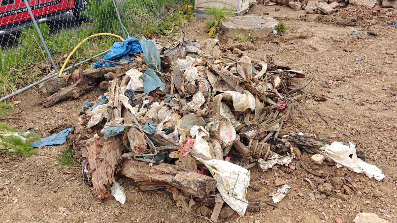 Plastic timber and general waste separated from mixed fill before disposal