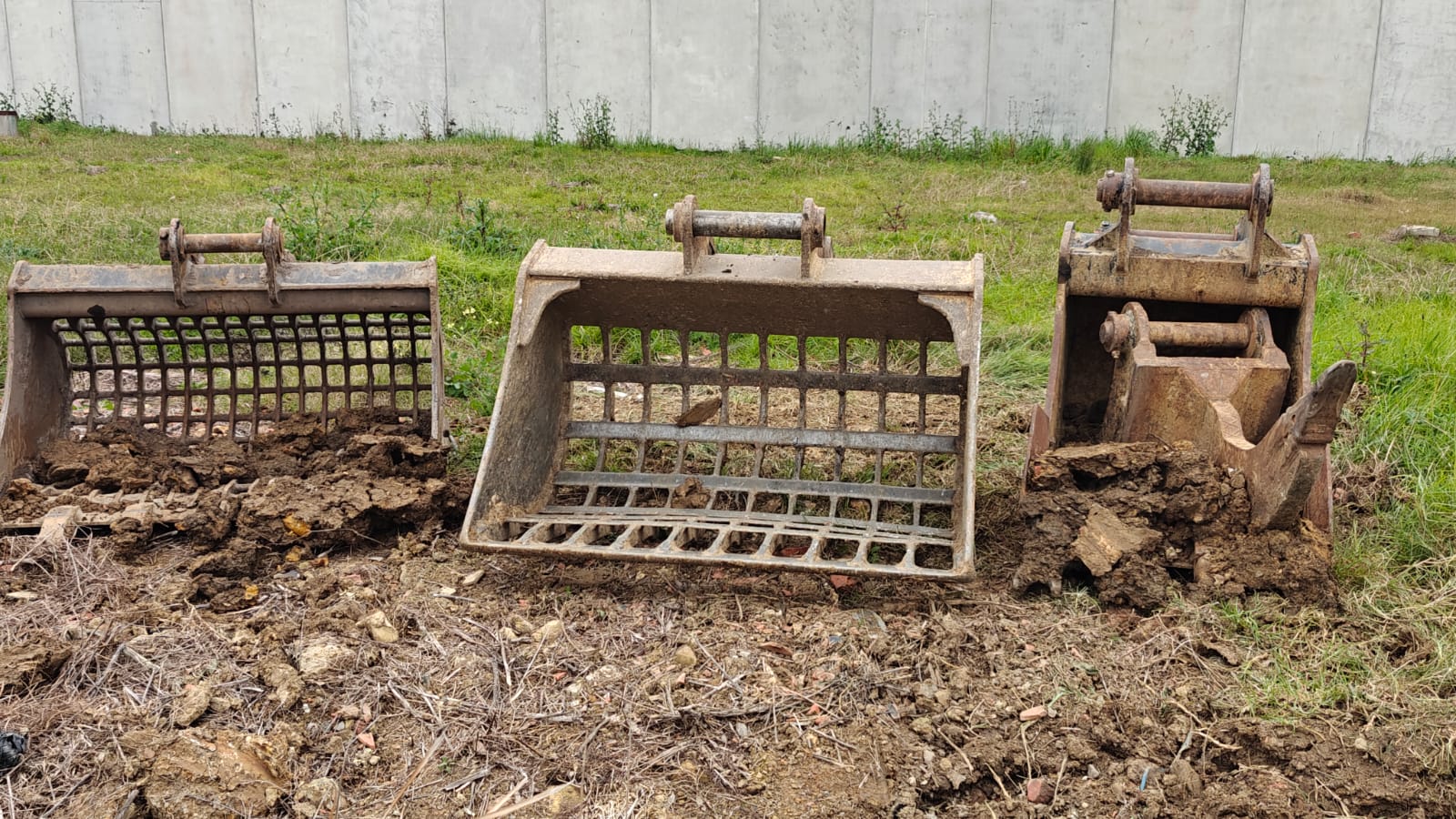 Excavator sifting buckets used for double sifting mixed fill on a development site