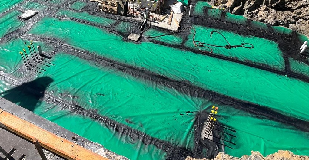 Below-slab vapour mitigation membrane installed on a contaminated development site